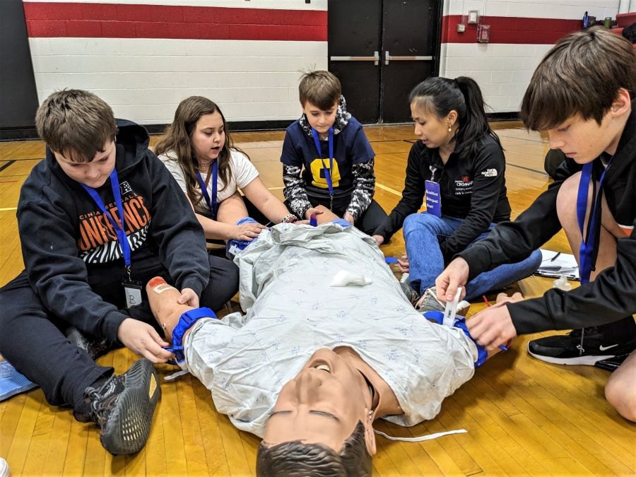 Children's Hospital medical staff teaching first aid to BMS students.